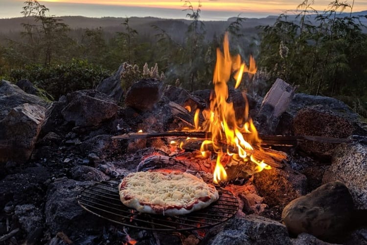 pizza baking on campfire